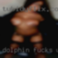 Dolphin fucks woman water
